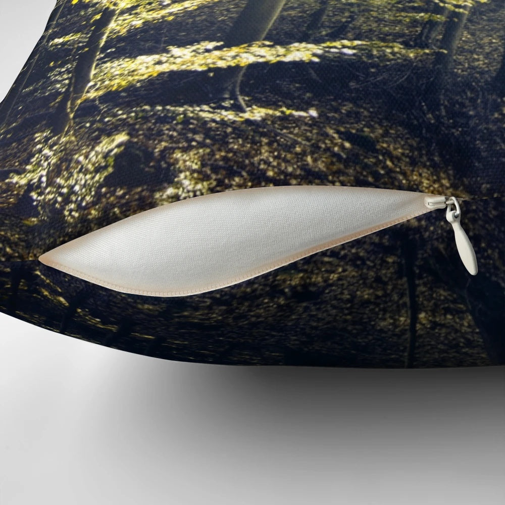 A Pillow featuring a serene forest landscape with rays of morning light filtering through the trees.