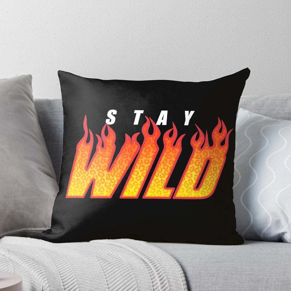 Stay Wild Fire Merch Pillow featuring a vibrant leopard print design