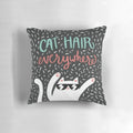 A soft, plush pillow covered in cat hair, perfect for the ultimate cat lover.