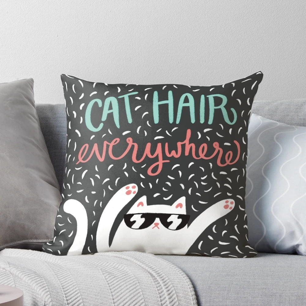 A soft, plush pillow covered in cat hair, perfect for the ultimate cat lover.
