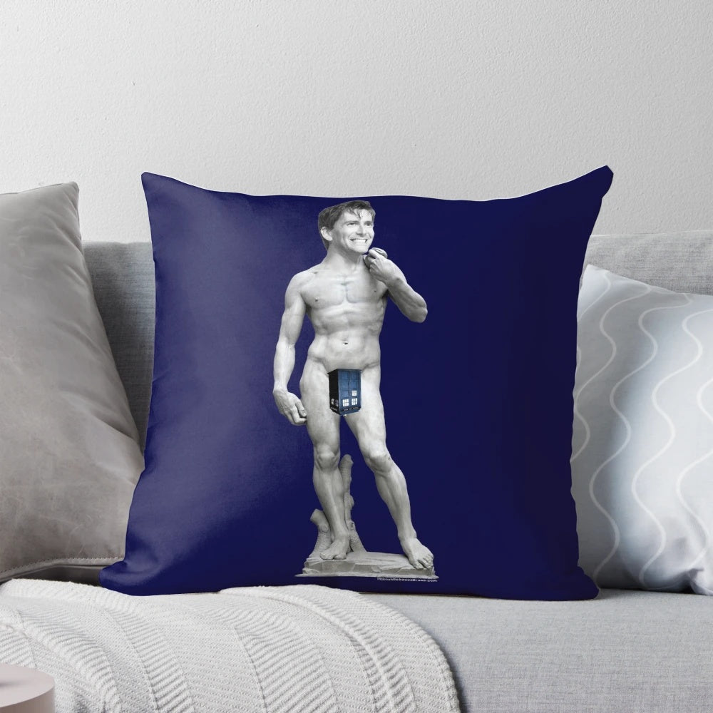 A plush pillow featuring a stylized image of actor David Tennant as the beloved Doctor from the popular sci-fi series Doctor Who.