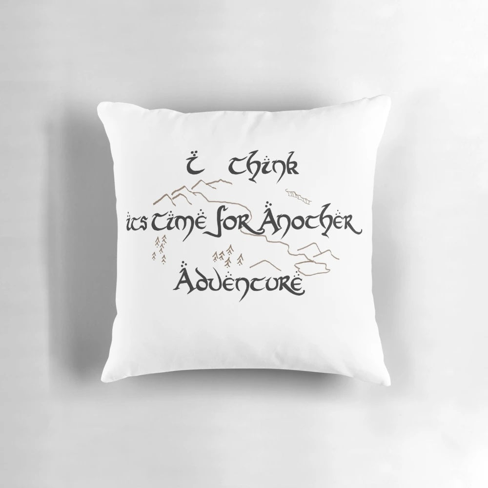 A plush adventure pillow with a Lord of the Rings inspired design, featuring Bilbo Baggins and Frodo on a fantastical journey.