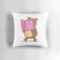 A soft, plush pillow in the shape of a shy bear, perfect for readers and introverts