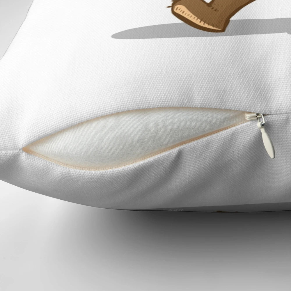 A soft, plush pillow in the shape of a shy bear, perfect for readers and introverts