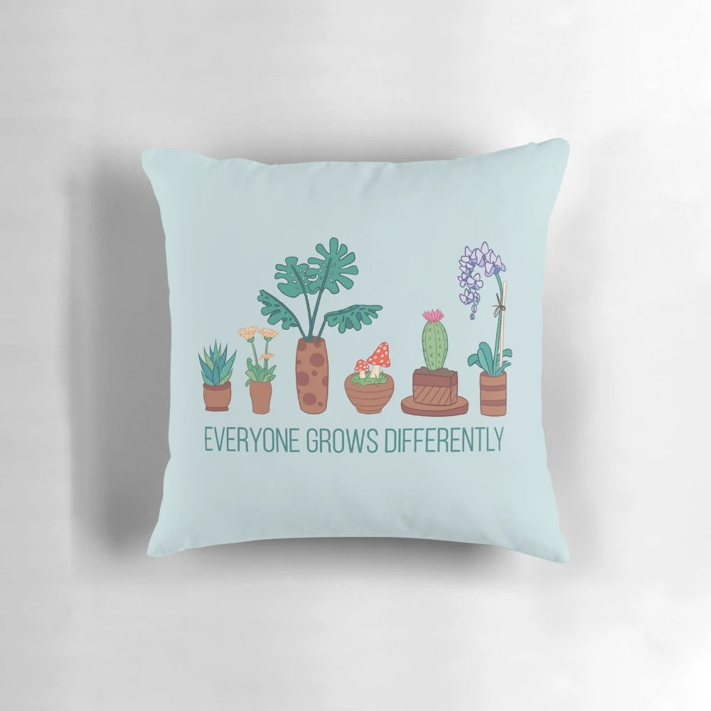 A vibrant illustration of various plants, including a cactus, succulent, and flowers, symbolizing the beauty of individual growth and self-acceptance.