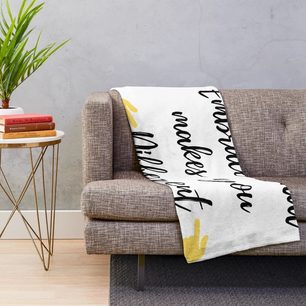 Plush blanket with the text "Embrace what makes you different