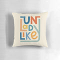Vibrant UNLADYLIKE graphic design pillow featuring bold lettering and a feminist message.