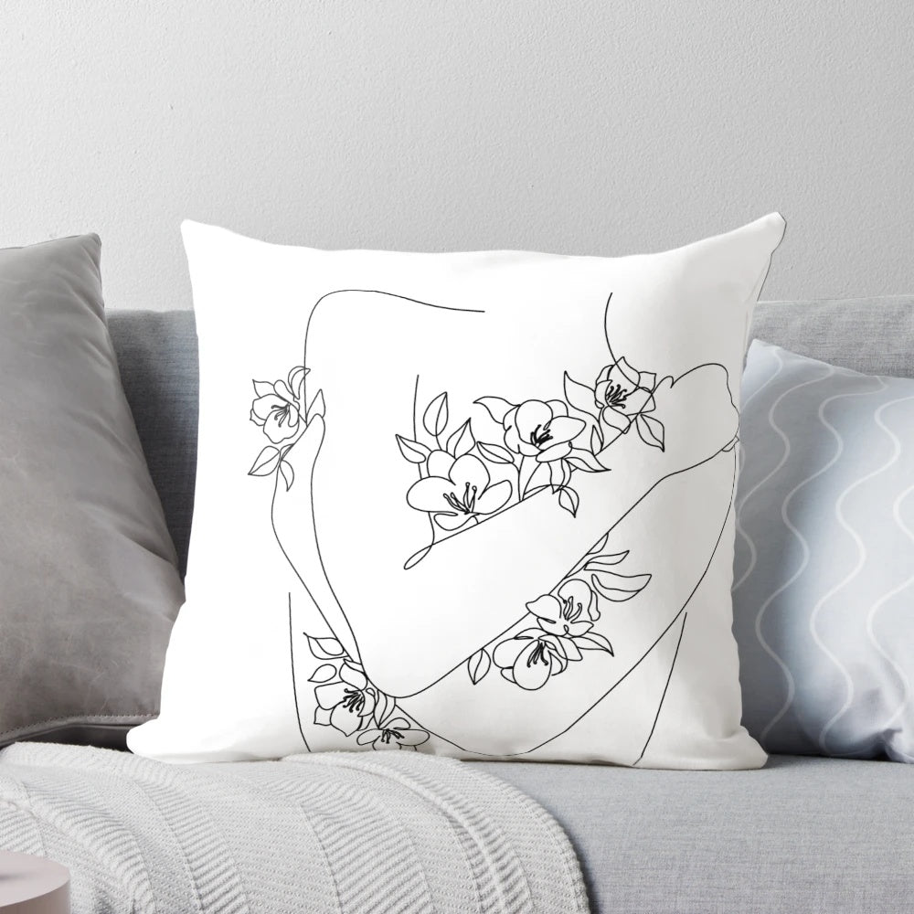 A line art illustration of a woman embracing herself, with flowers growing around her.