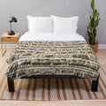 Embroidered plush blanket featuring the iconic Bayeux Tapestry imagery