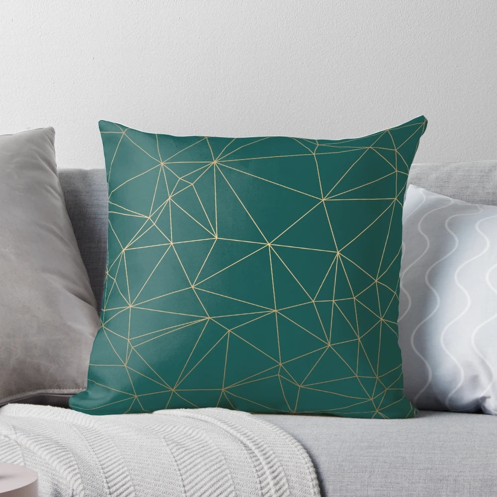 Emerald green and gold geometric pattern pillow with gold shimmer
