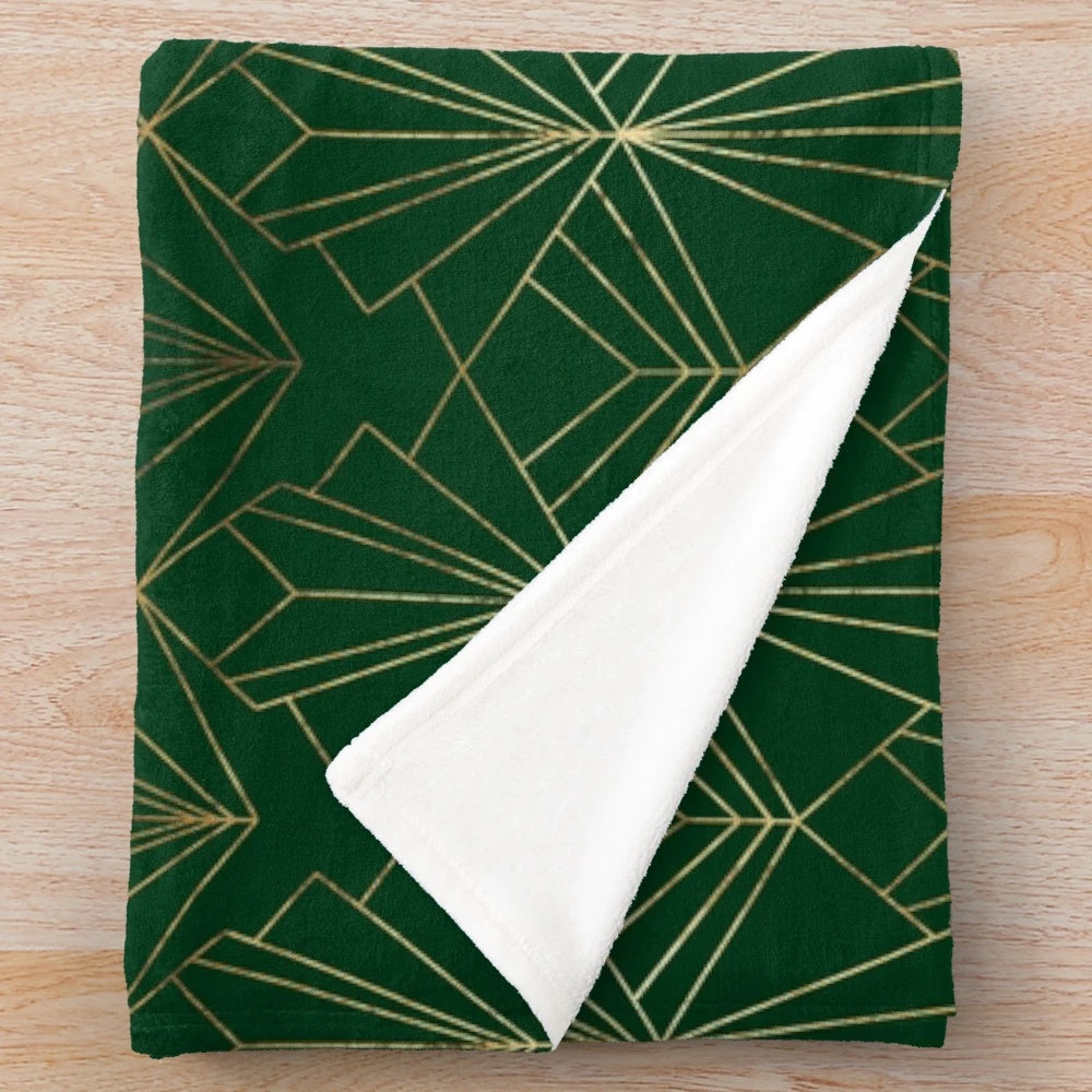 Emerald green plush blanket with art deco geometric pattern