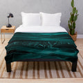Emerald green plush blanket with marble and agate inspired patterns