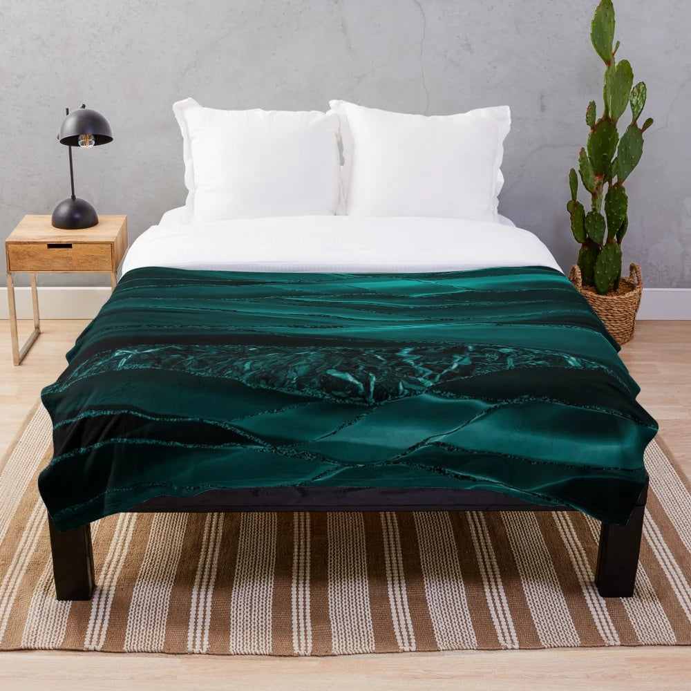 Emerald green plush blanket with marble and agate inspired patterns