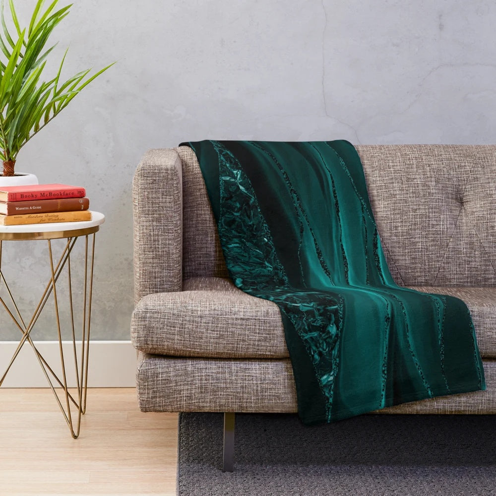 Emerald green plush blanket with marble and agate inspired patterns