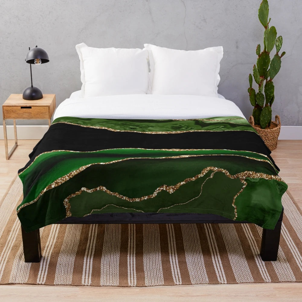 Emerald green plush blanket with faux malachite marble texture
