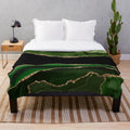 Emerald green plush blanket with faux malachite marble texture