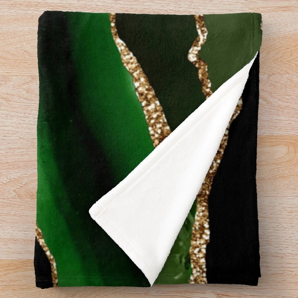 Emerald green plush blanket with faux malachite marble texture