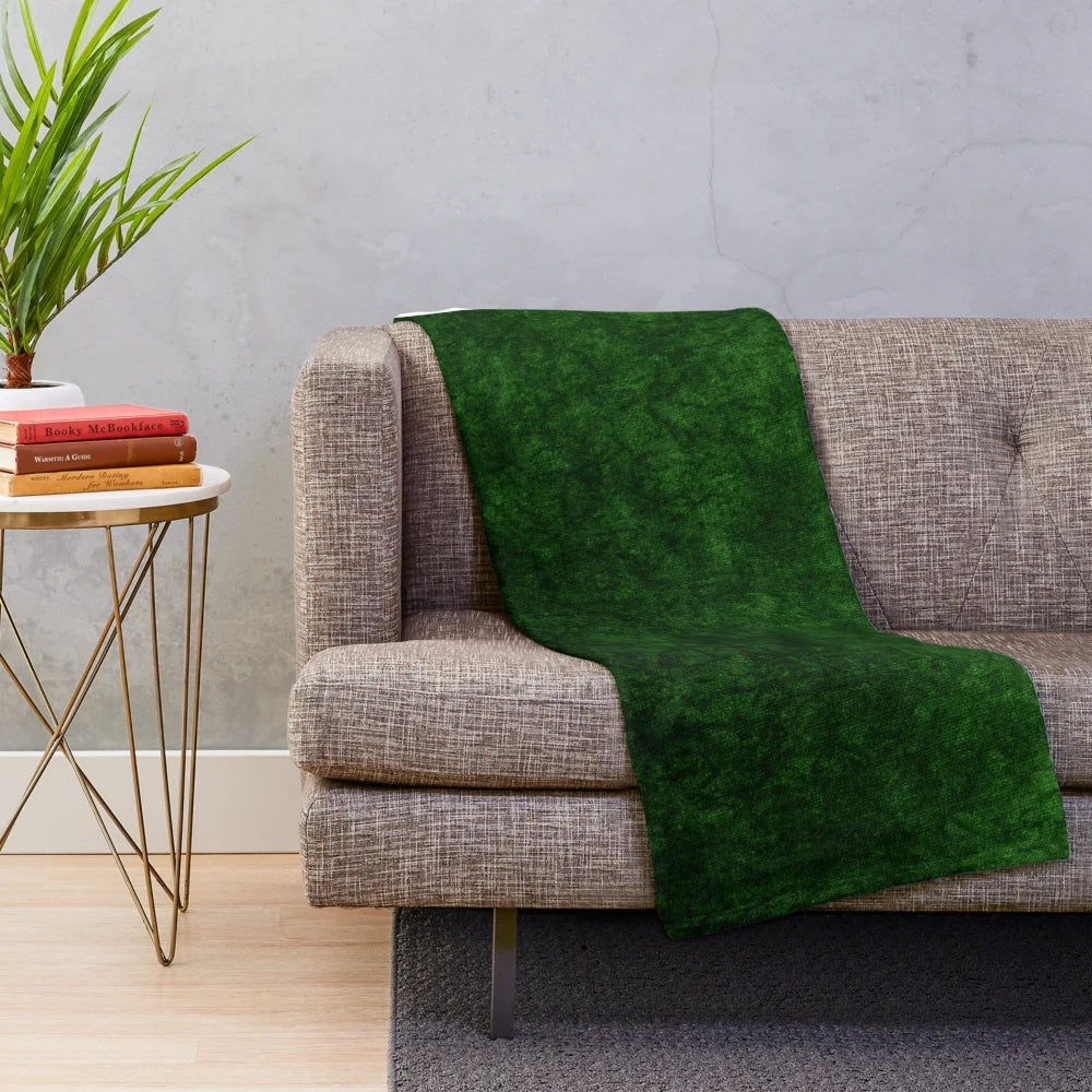 Emerald green velvet plush blanket with a soft, textured design