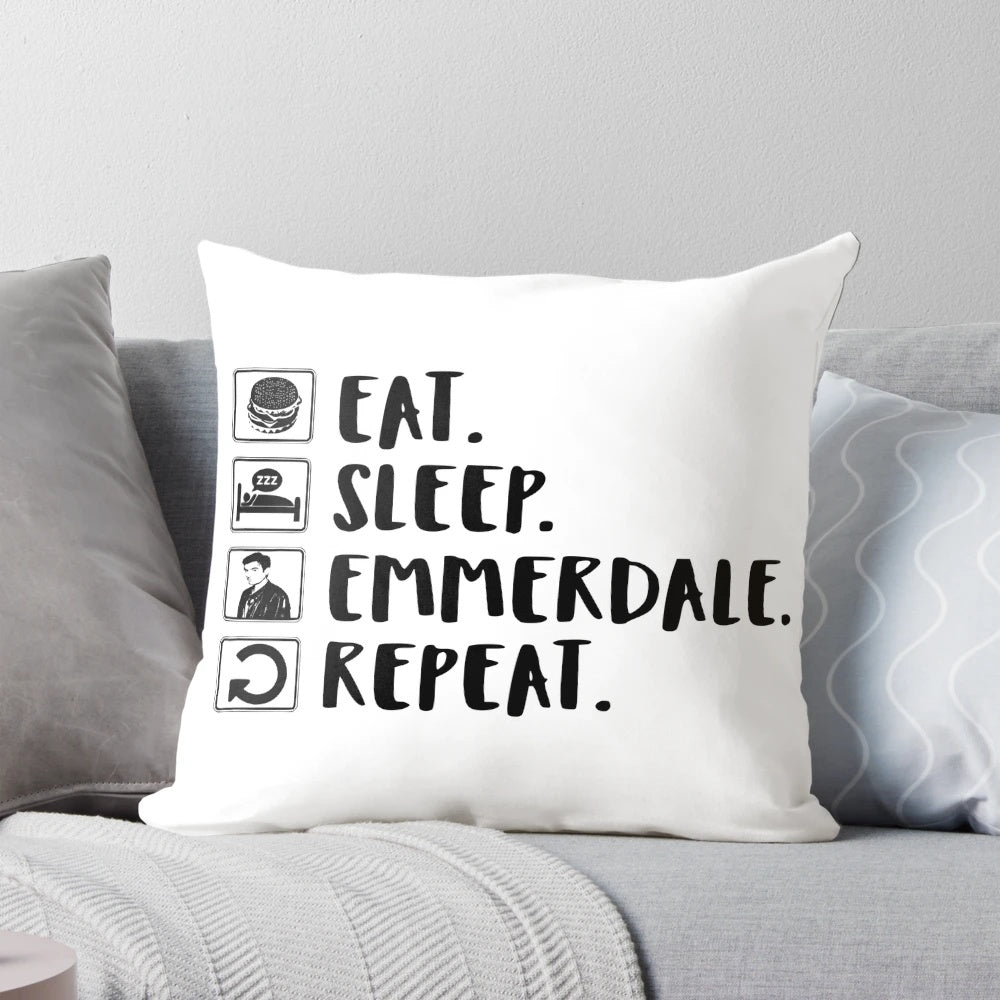 Emmerdale-themed throw pillow with "Eat. Sleep. Emmerdale. Repeat." design