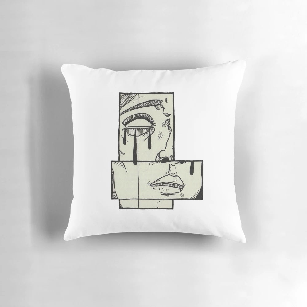 A soft, gray pillow with the word "Sadness" printed on it, designed to provide comfort during difficult times.