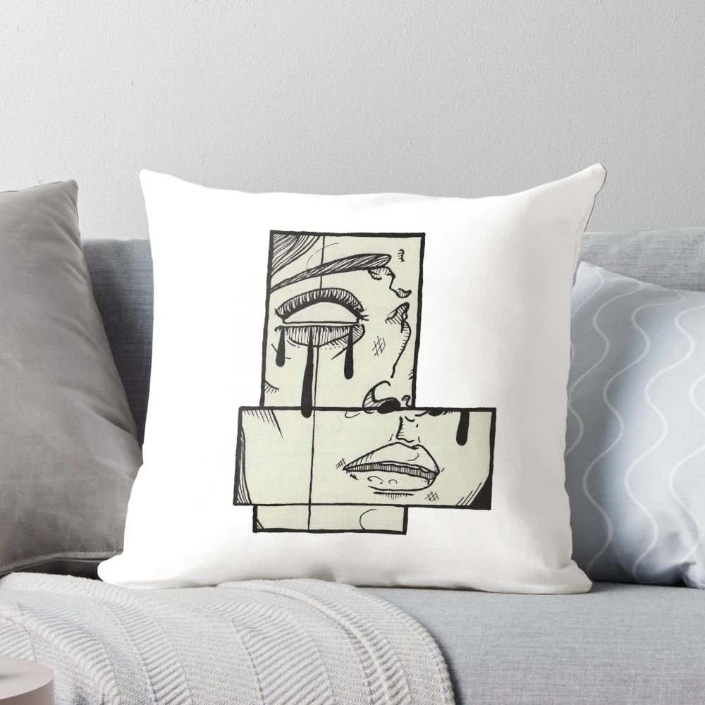 A soft, gray pillow with the word "Sadness" printed on it, designed to provide comfort during difficult times.
