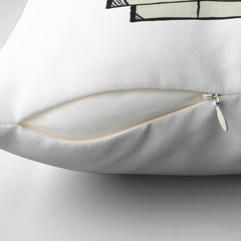 A soft, gray pillow with the word "Sadness" printed on it, designed to provide comfort during difficult times.