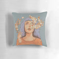 Artistic surreal portrait pillow with moon and floral elements