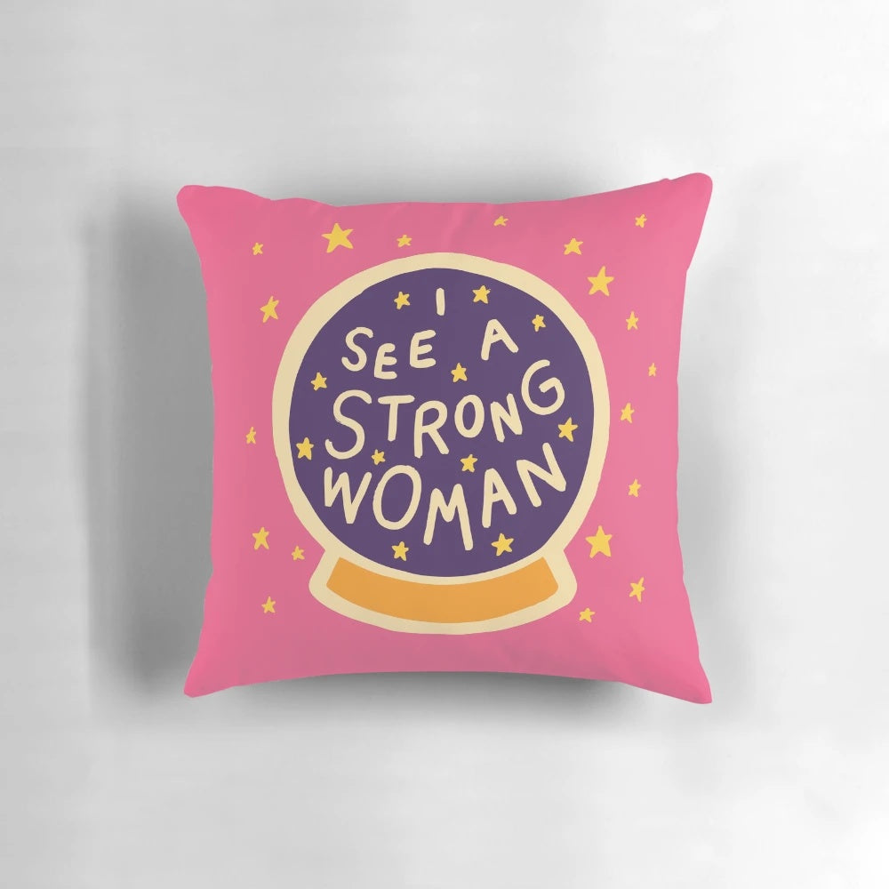 Decorative pillow featuring the text "I See a Strong Woman" in a modern design, symbolizing female empowerment and strength.