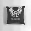 Pillow featuring the text "RBG Never Underestimate the Power of a Girl With a Book" with images of books and a female figure.