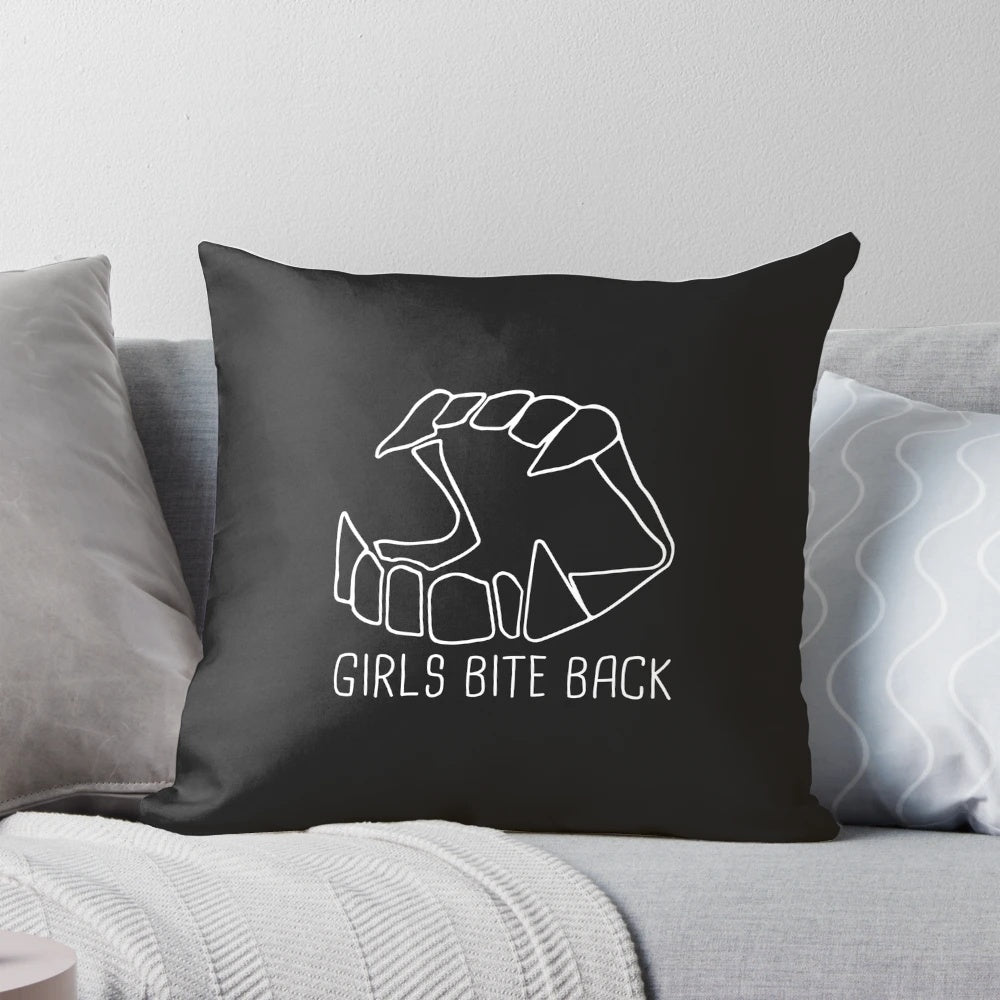 Empowered women bite back pillow with feminist and girl gang design