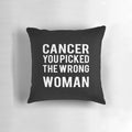 A white pillow with the text "Cancer: You Picked the Wrong Woman" printed on it, representing the strength and resilience of a cancer survivor.