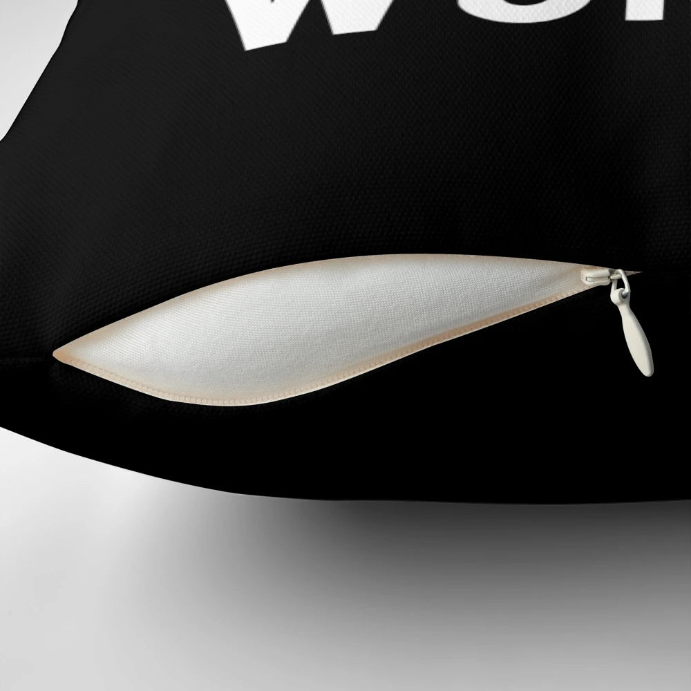 A white pillow with the text "Cancer: You Picked the Wrong Woman" printed on it, representing the strength and resilience of a cancer survivor.