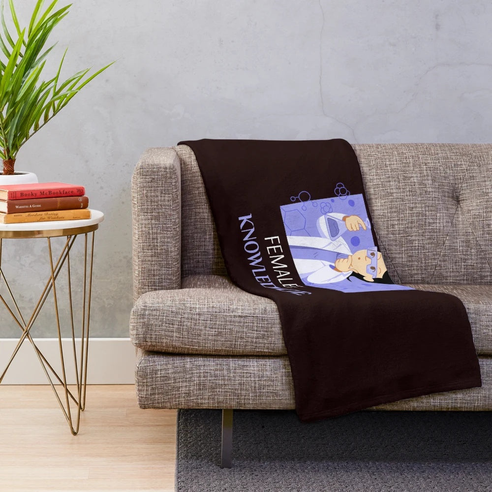Plush blanket featuring inspiring science quotes and a female scientist symbol