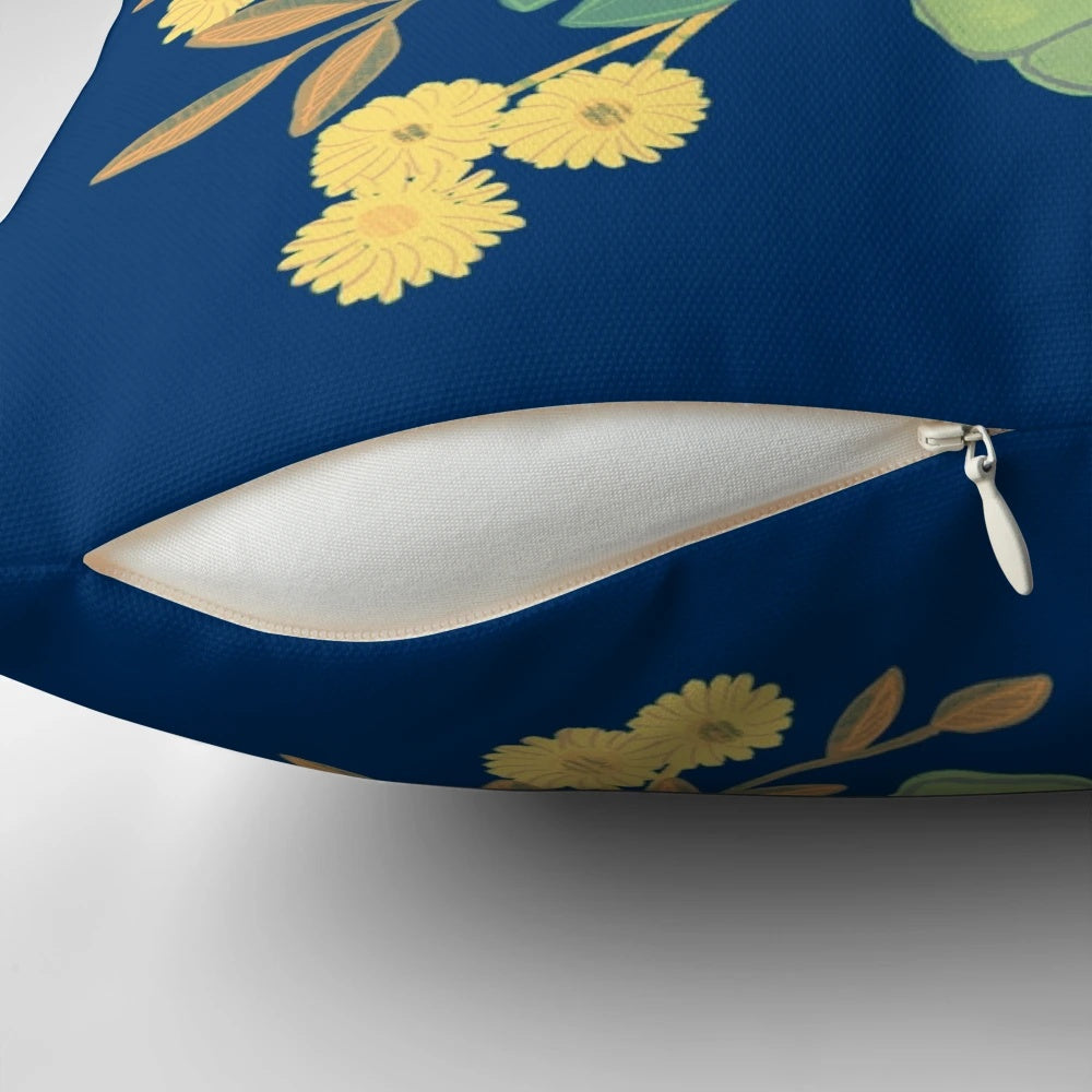 A beautiful blue and white pillow with a floral design and the words "nevertheless she persisted" - an inspirational home decor item for female empowerment.