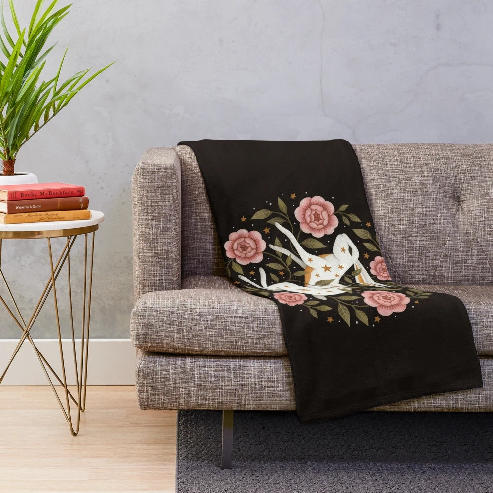 Enchanted plush blanket with floral and animal designs
