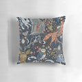 A whimsical gothic pattern pillow featuring owls, foxes, wolves, deer, crows, and mushrooms in a dark, enchanted forest setting