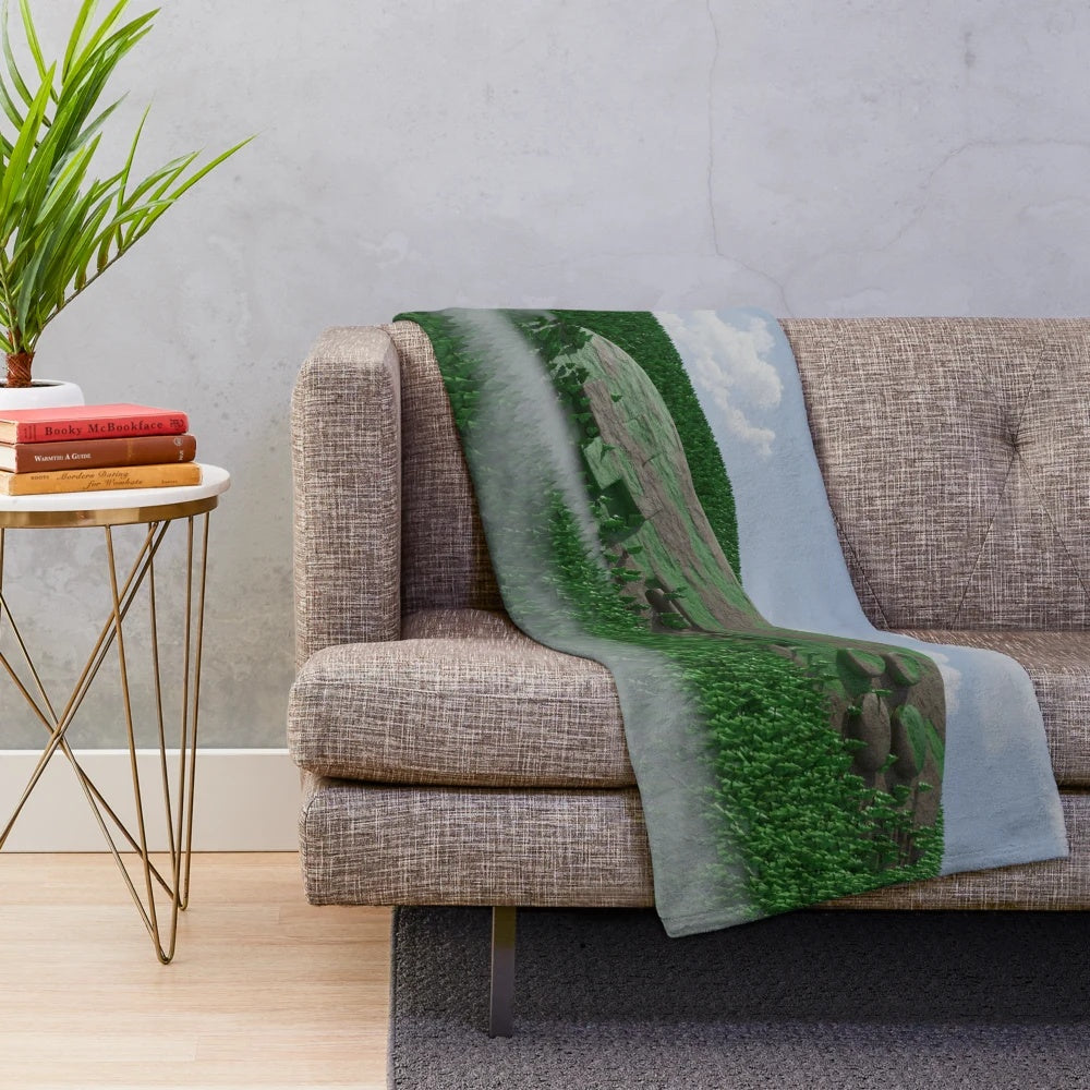 Plush blanket featuring a hidden gamepad in a whimsical, surreal forest landscape