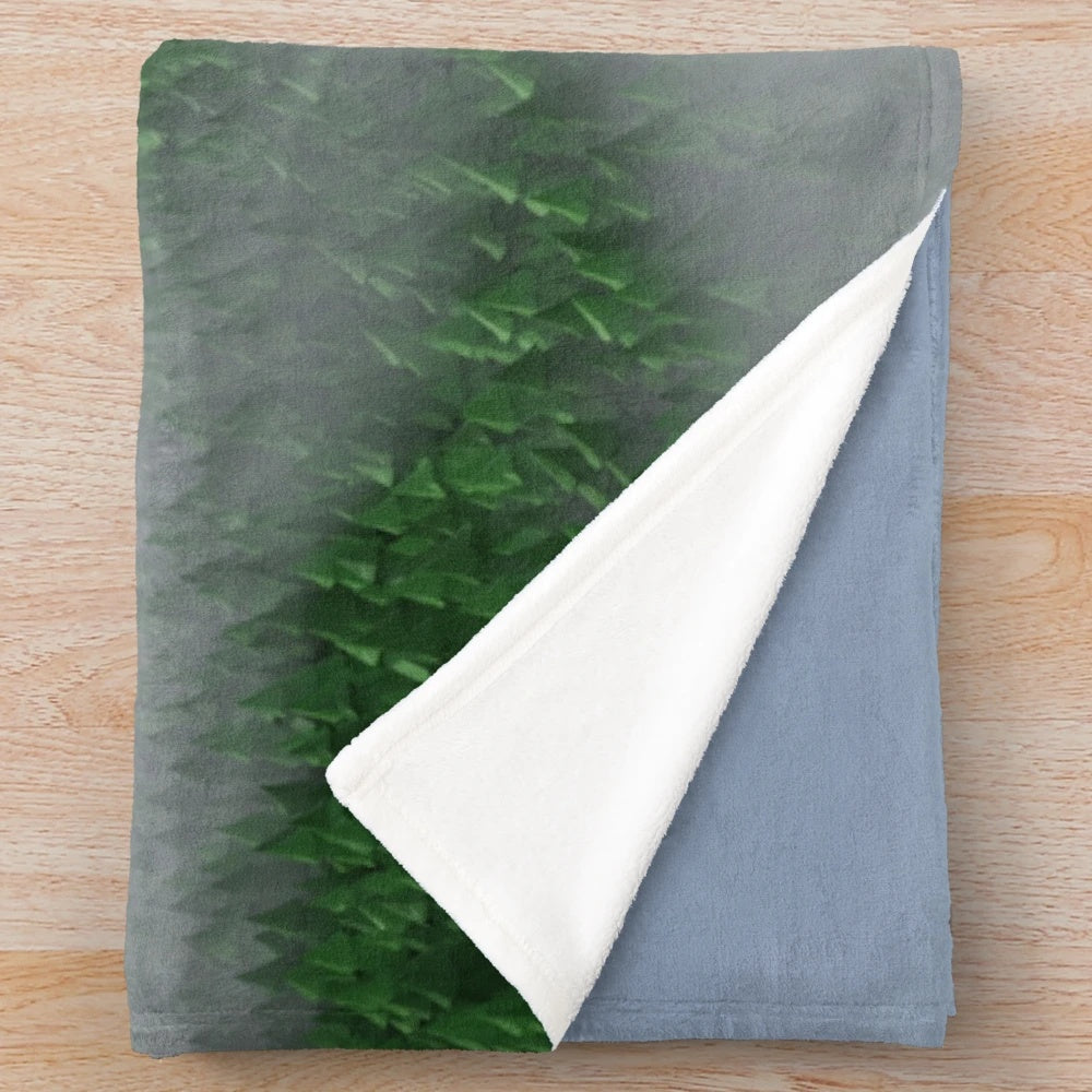 Plush blanket featuring a hidden gamepad in a whimsical, surreal forest landscape