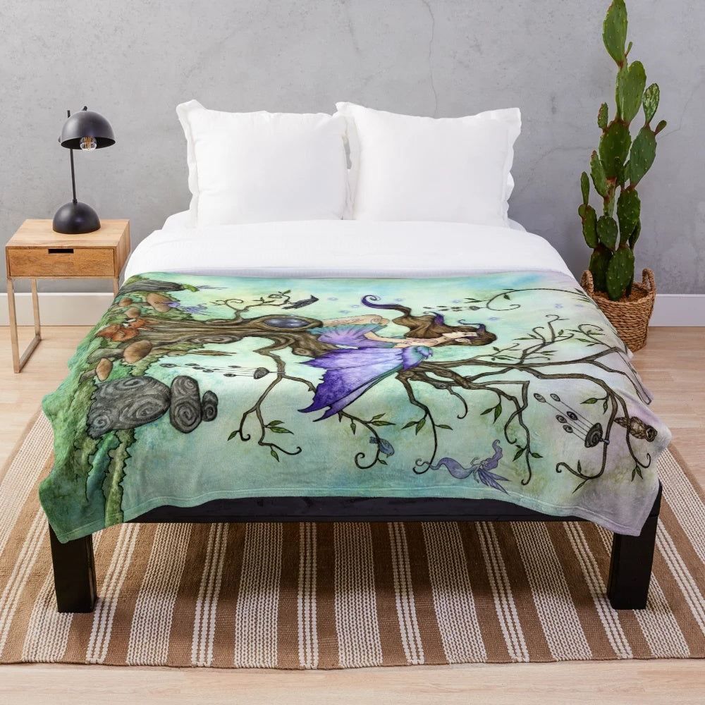 Soft and cozy plush blanket with fantasy woodland creatures and magical elements