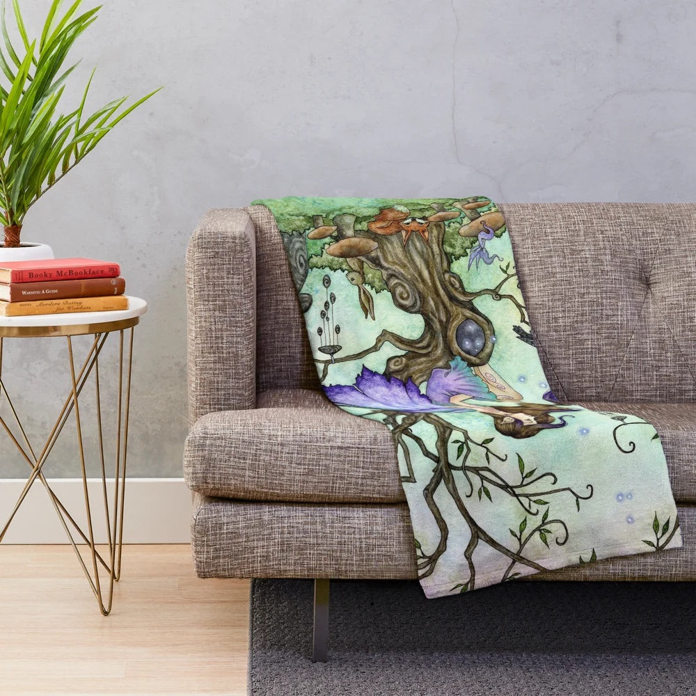 Soft and cozy plush blanket with fantasy woodland creatures and magical elements