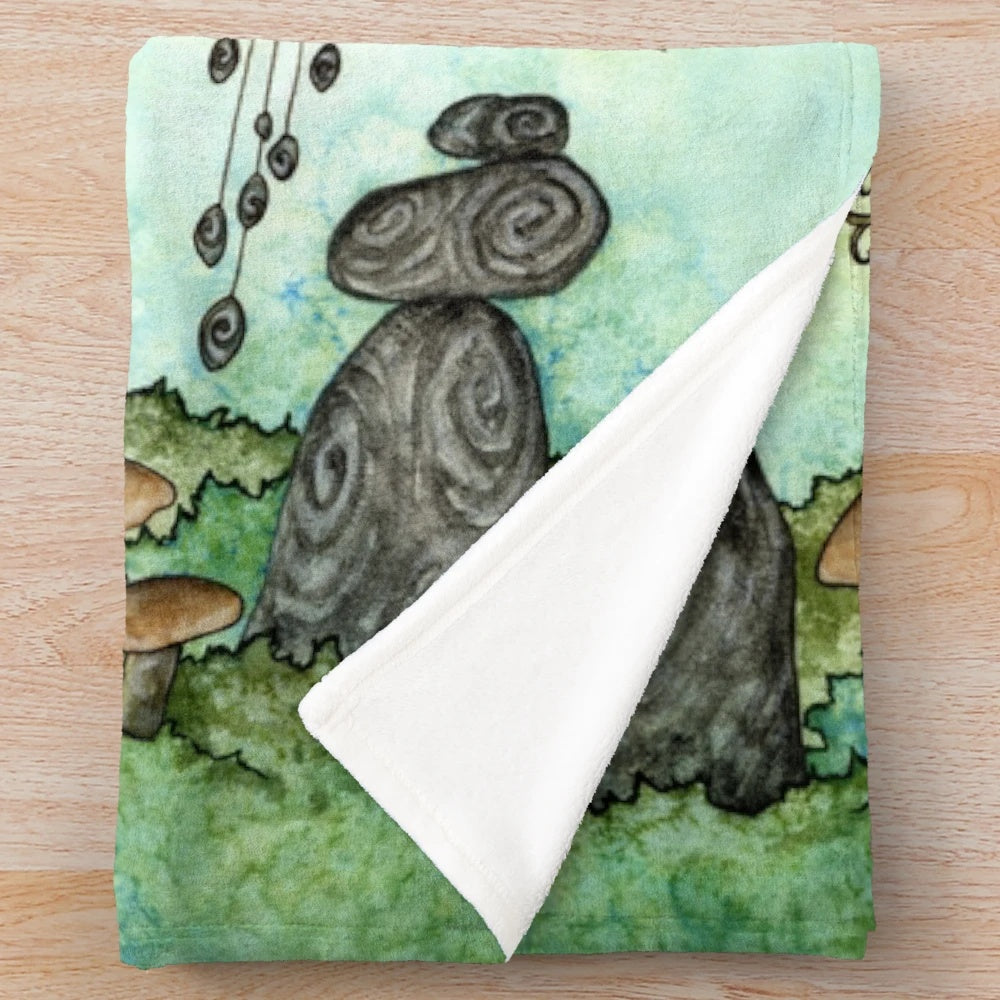Soft and cozy plush blanket with fantasy woodland creatures and magical elements