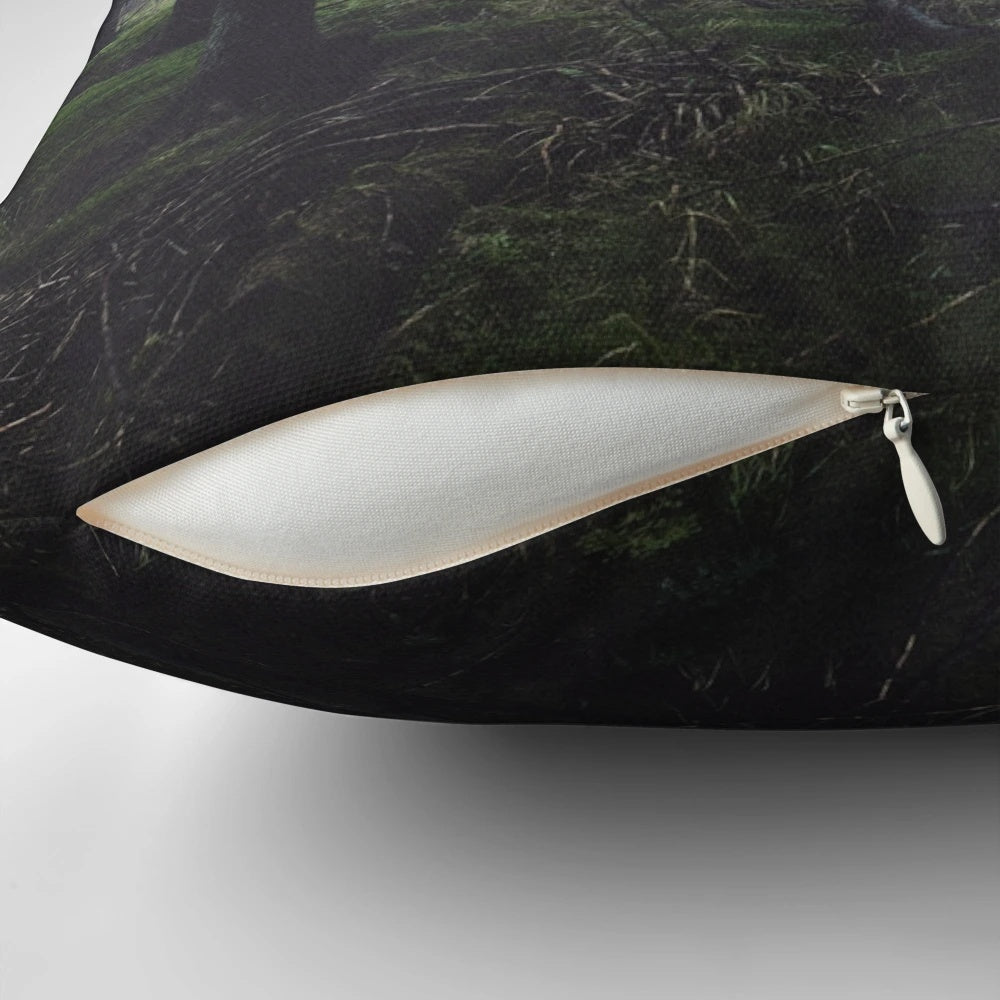 Pillow featuring a dreamy, misty forest scene with trees and fog