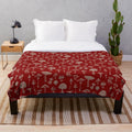 Soft and cozy plush blanket with whimsical forest and mushroom design