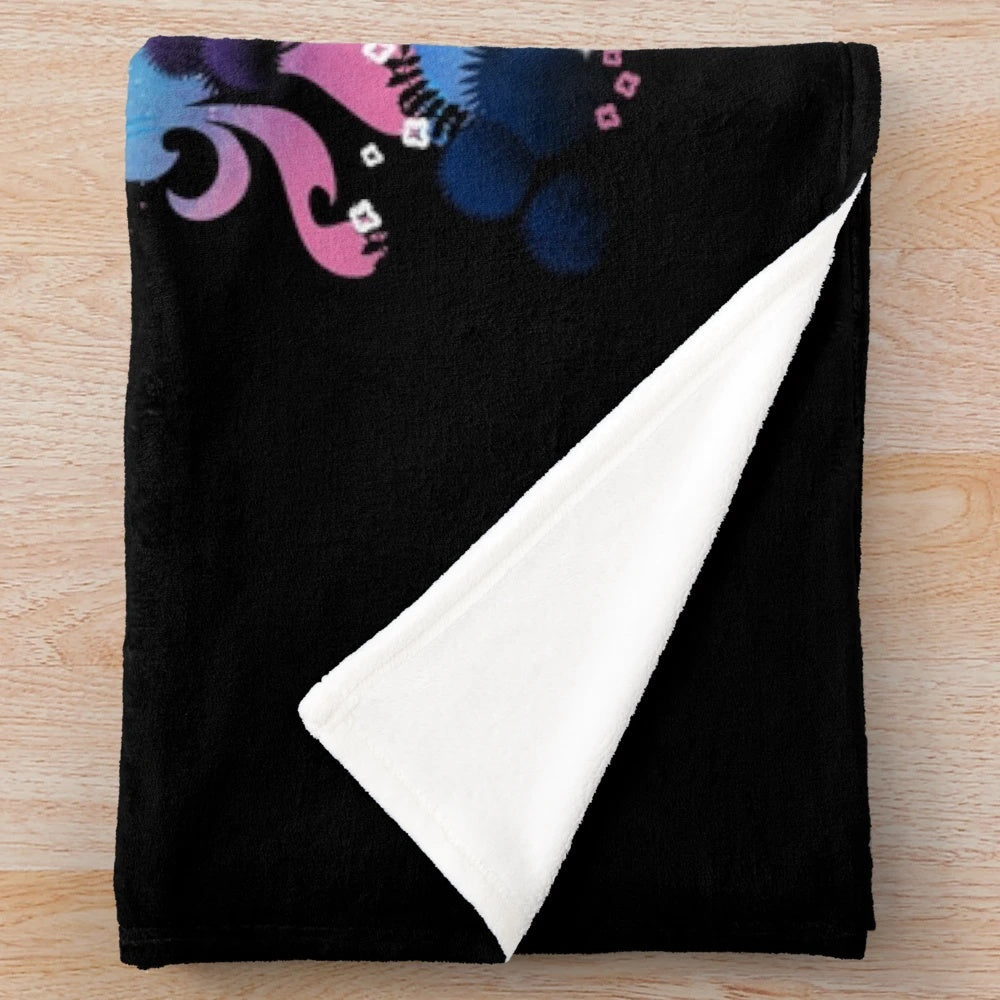 Soft and cozy plush blanket with a magical forest and unicorn design