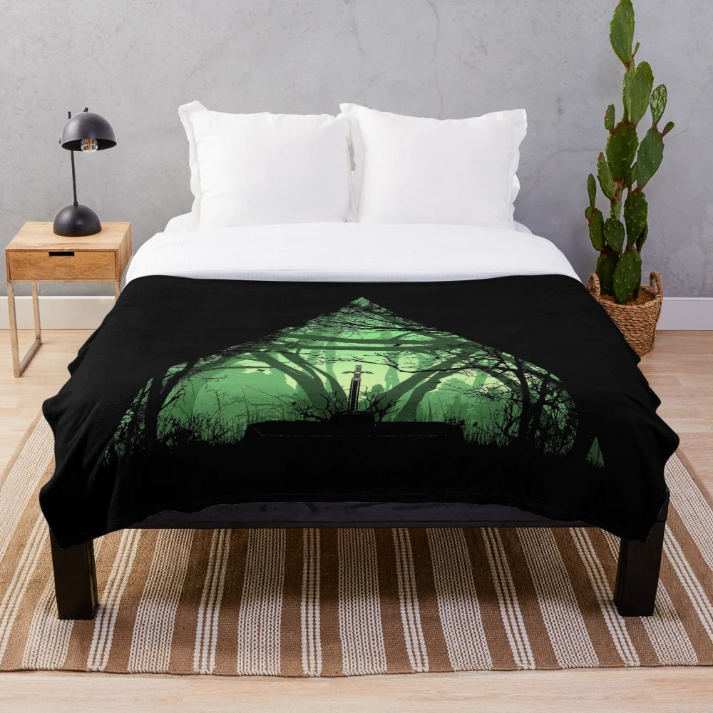 Plush blanket with fantasy landscape and sword design