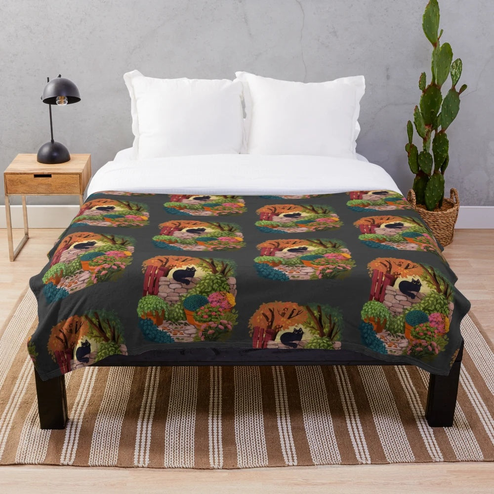 Cozy plush blanket featuring a playful cat in a magical garden setting