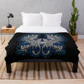Grey plush blanket with fantasy griffin design