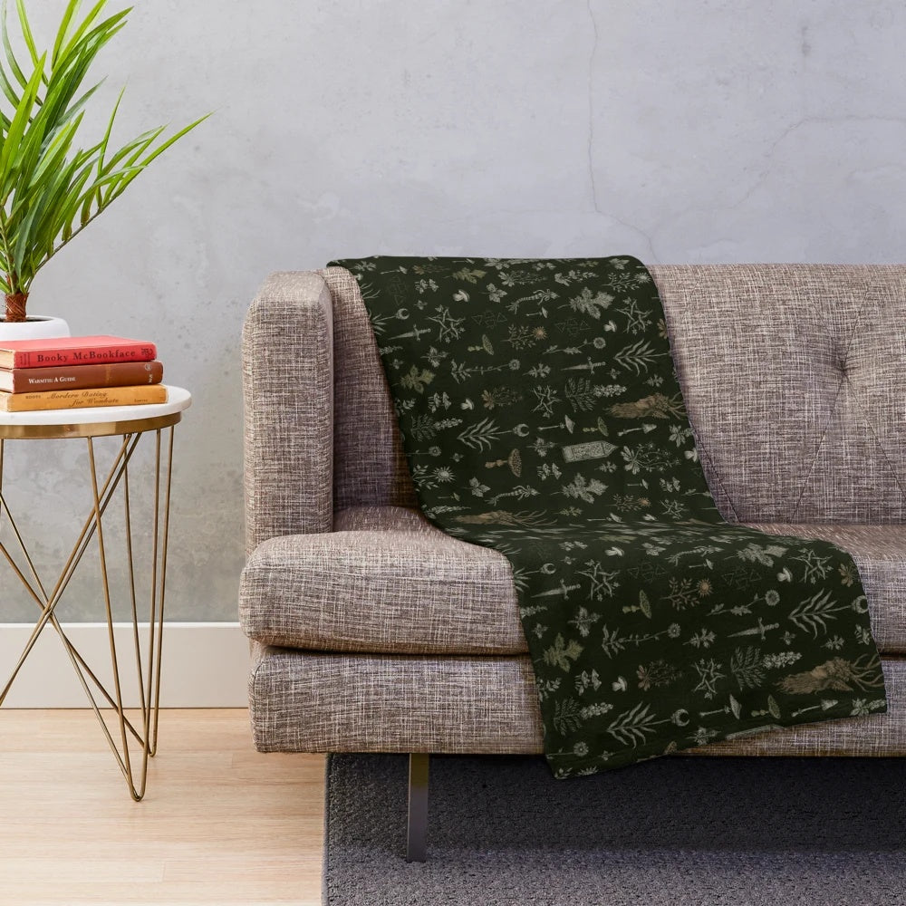 Plush blanket with magical forest and field design