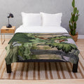 Plush blanket featuring a fantasy forest scene with a fairy maiden