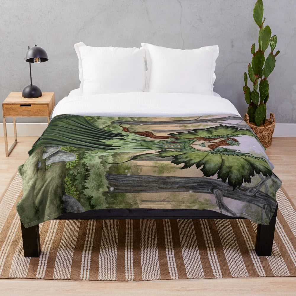 Plush blanket featuring a fantasy forest scene with a fairy maiden